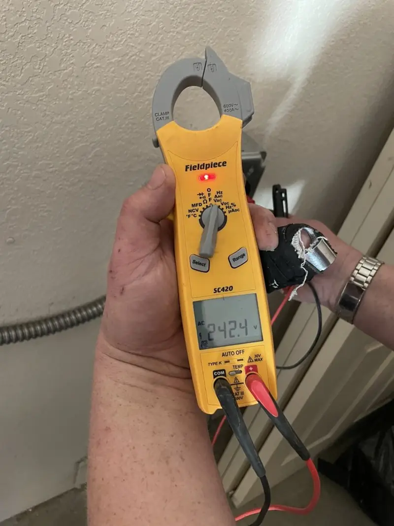 Voltage testing with clamp meter during Generator Installation in Warner Robins